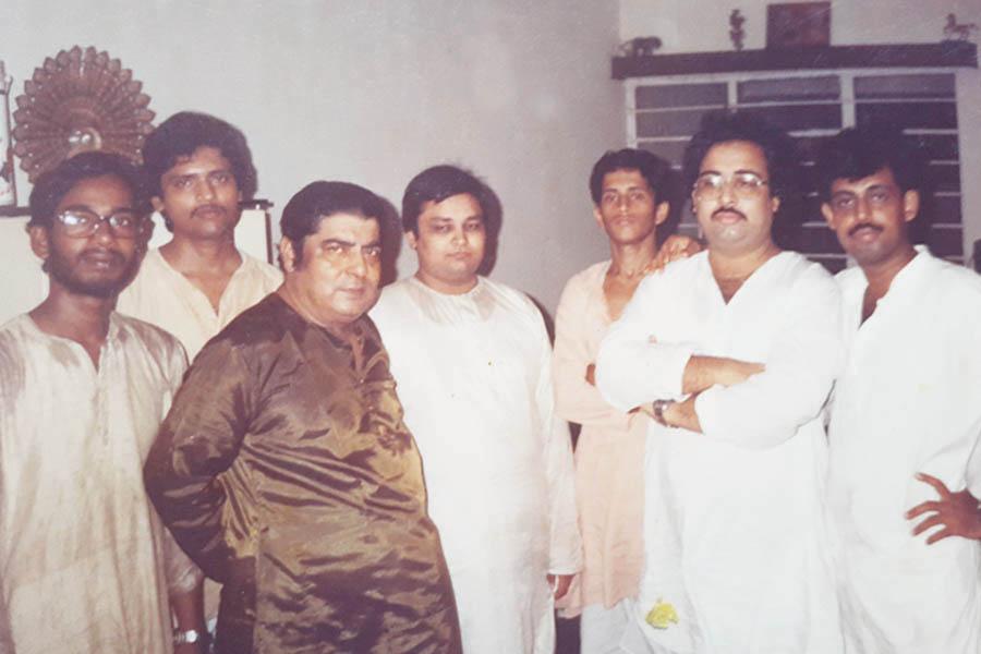 Brahmachari Girish with renowned Tabla Maestro Pundit Shyamal Bose at his residence, Calcutta during recruitment process of musicians. Absolute right is Pundit Somnath Mukhergee, disciple of Shyamal Dada and famous Tabla player. Next left to Somnath is famous Sarod player Pundit Tejendra Narayan Majoomdar. 1987 winter